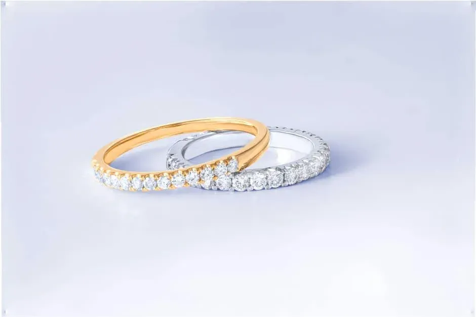 Yellow-gold-tone and white-metal diamond bands