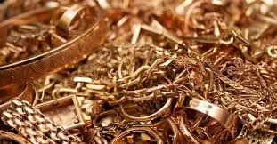 Mixed gold chains and jewelry in a scrap-gold pile