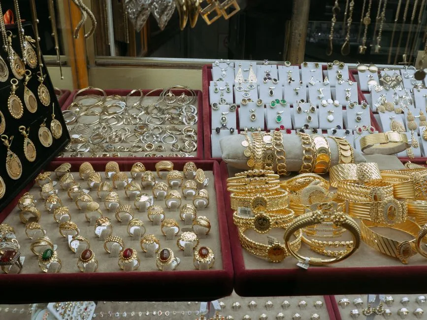 Trays of rings, earrings and bracelets in a jewelry display