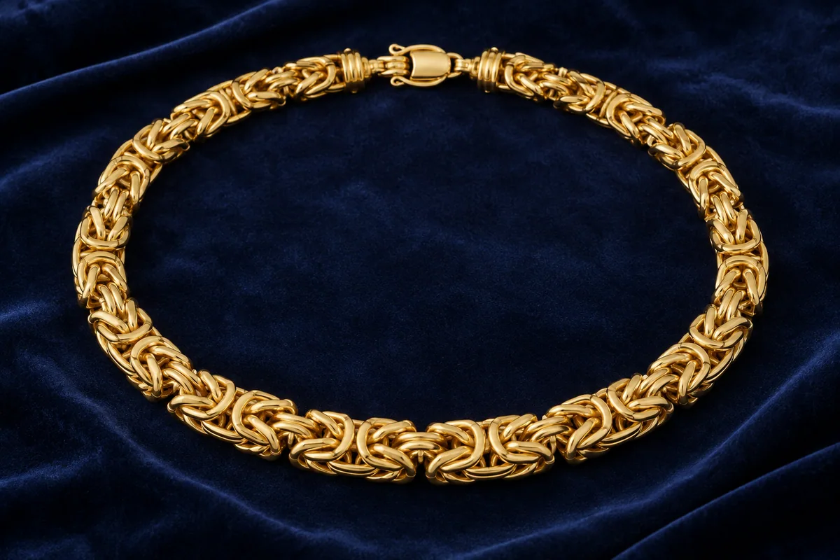 Substantial woven gold necklace on midnight-blue velvet